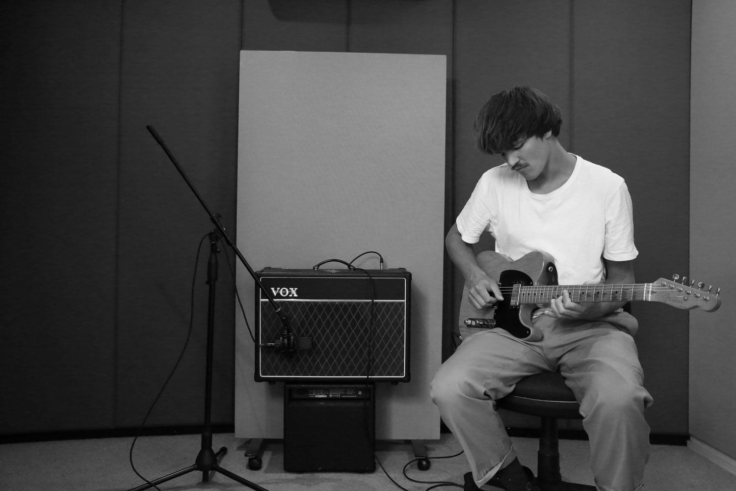 Sam Harding playing guitar in the Ultrasound6 studio